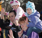 Alumni families enjoying the 2011 parade
