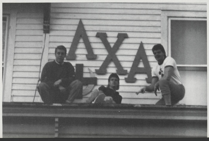 Lambda Chi Alpha members on the roof in 1989.