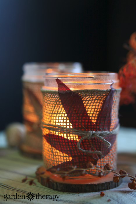 image of a jar wrapped with burlap, holding a small candle