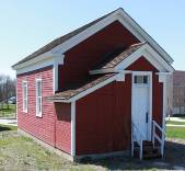 Photo of the Little Red Schoolhouse at UWW