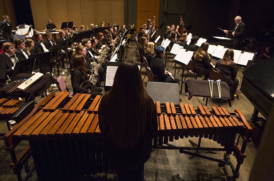 The UW-Whitewater Symphonic Wind Ensemble performs before a home audience at Young Auditorium.