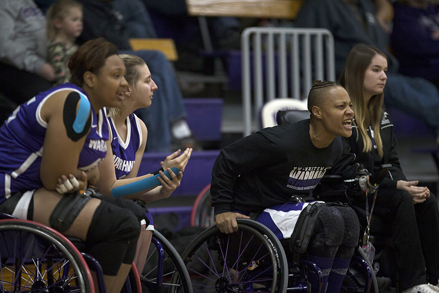 LeToi Adams yells from the sidelines of a wheelchair basketball game.