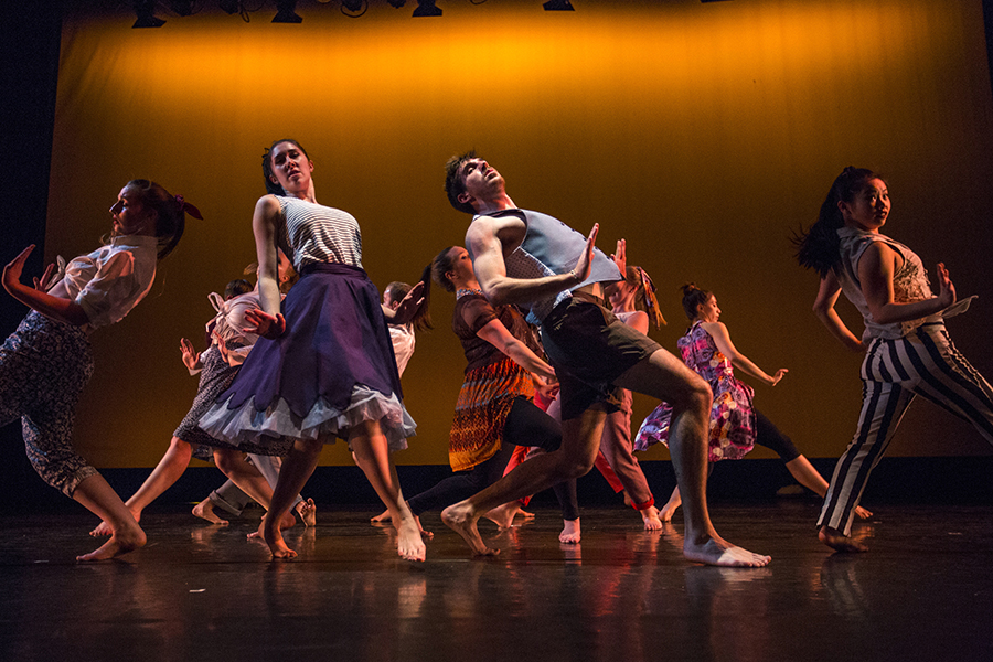 People dancing on stage.