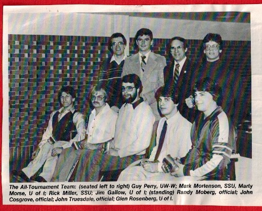 A black and white photo from the 1970's with John Truesdale and the wheelchair basketball team.