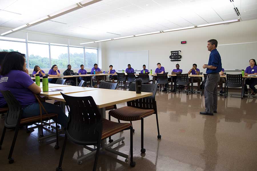 John Chenoweth teaching in class.