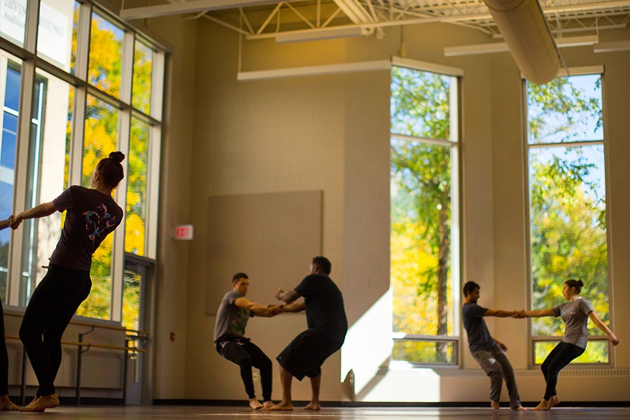 Image: Two women in a dance class, one is in a wheelchair
