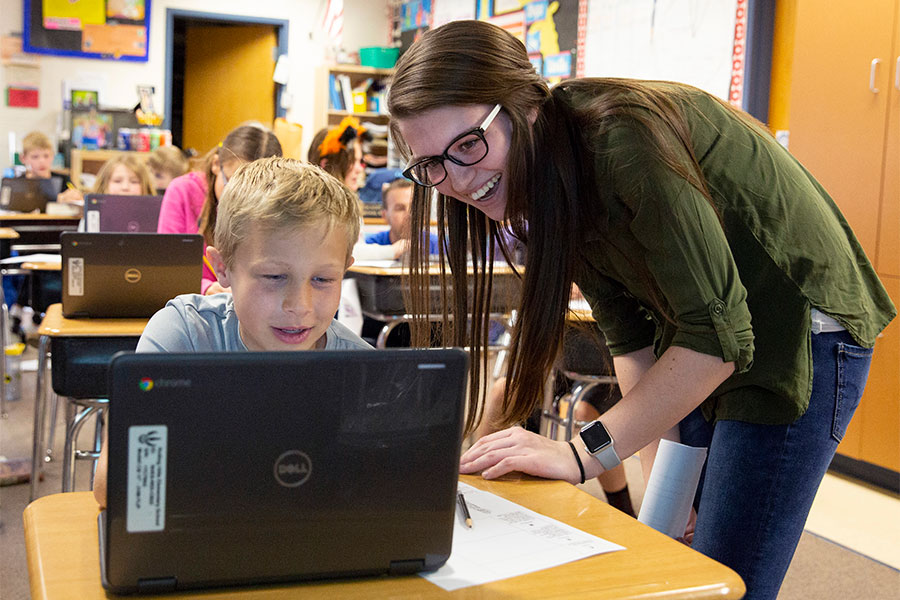 Education major at the University of Wisconsin Whitewater works hands-on with children.