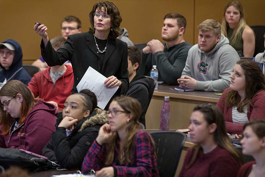 Lecturer Tammy French teaching students in Hyland Hall.