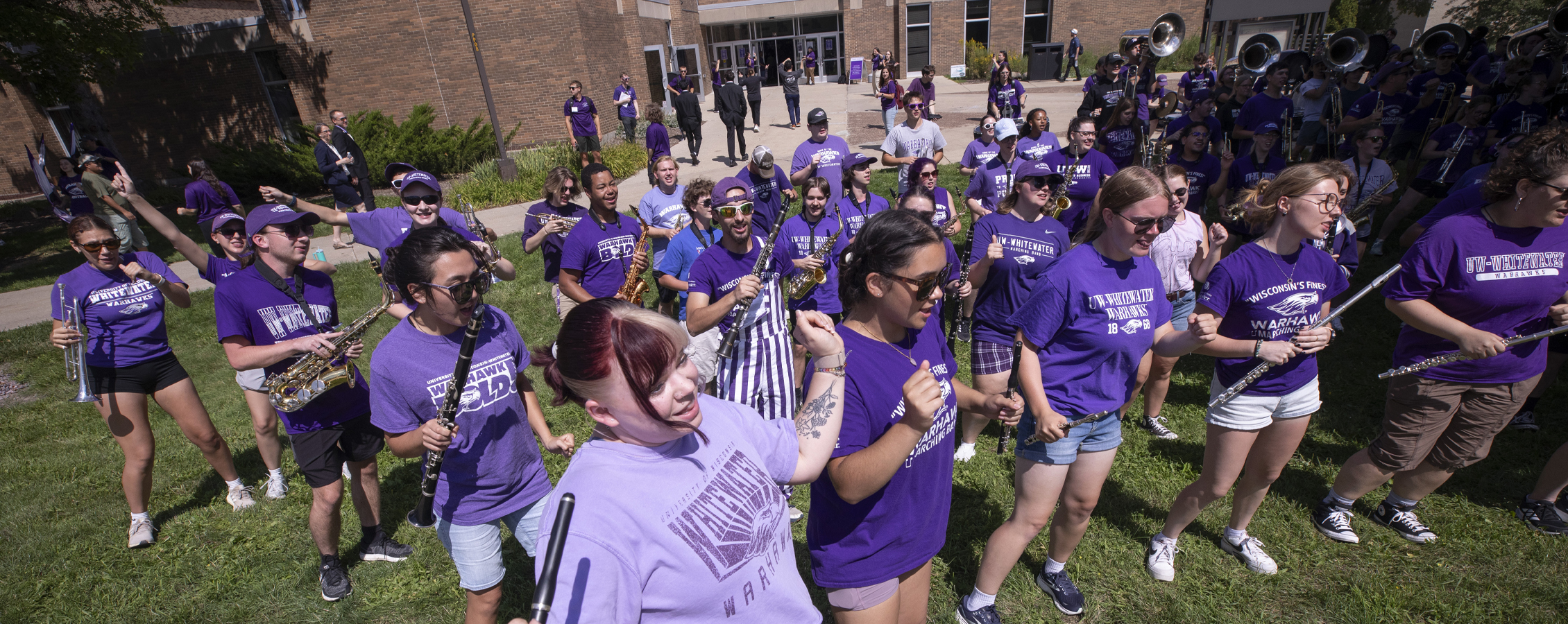 The Marching Band practices in front of Esker.