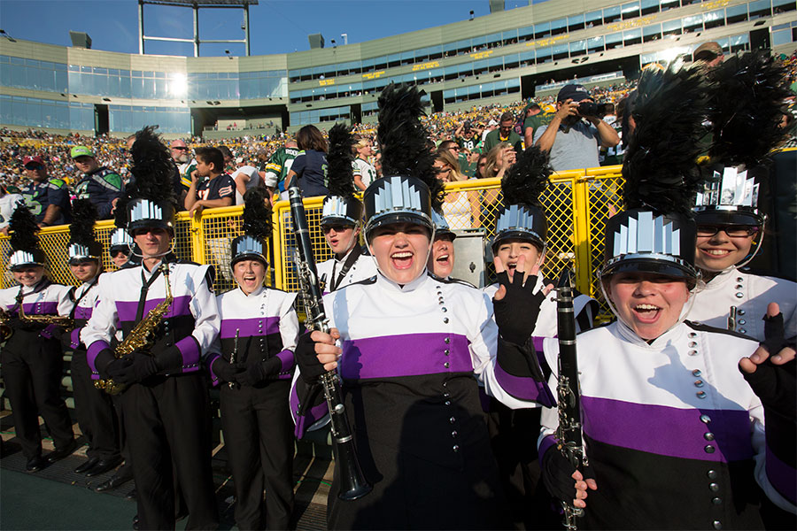 The UW-Whitewater Marching Band and Color Guard perform during a Packers game at Lambeau Field in Green Bay, Wisconsin.