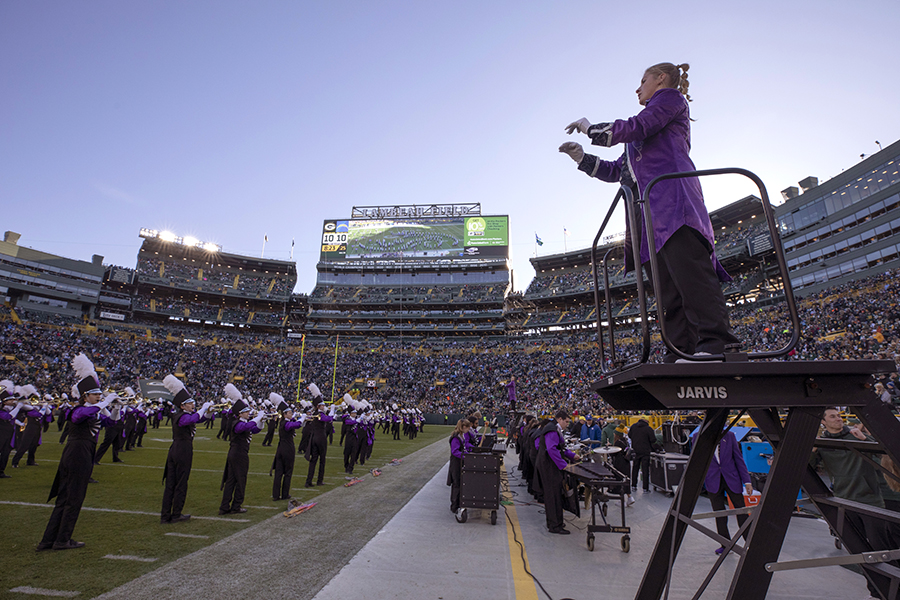 The UW-Whitewater Marching Band and Color Guard perform during a Packers game at Lambeau Field in Green Bay, Wisconsin.