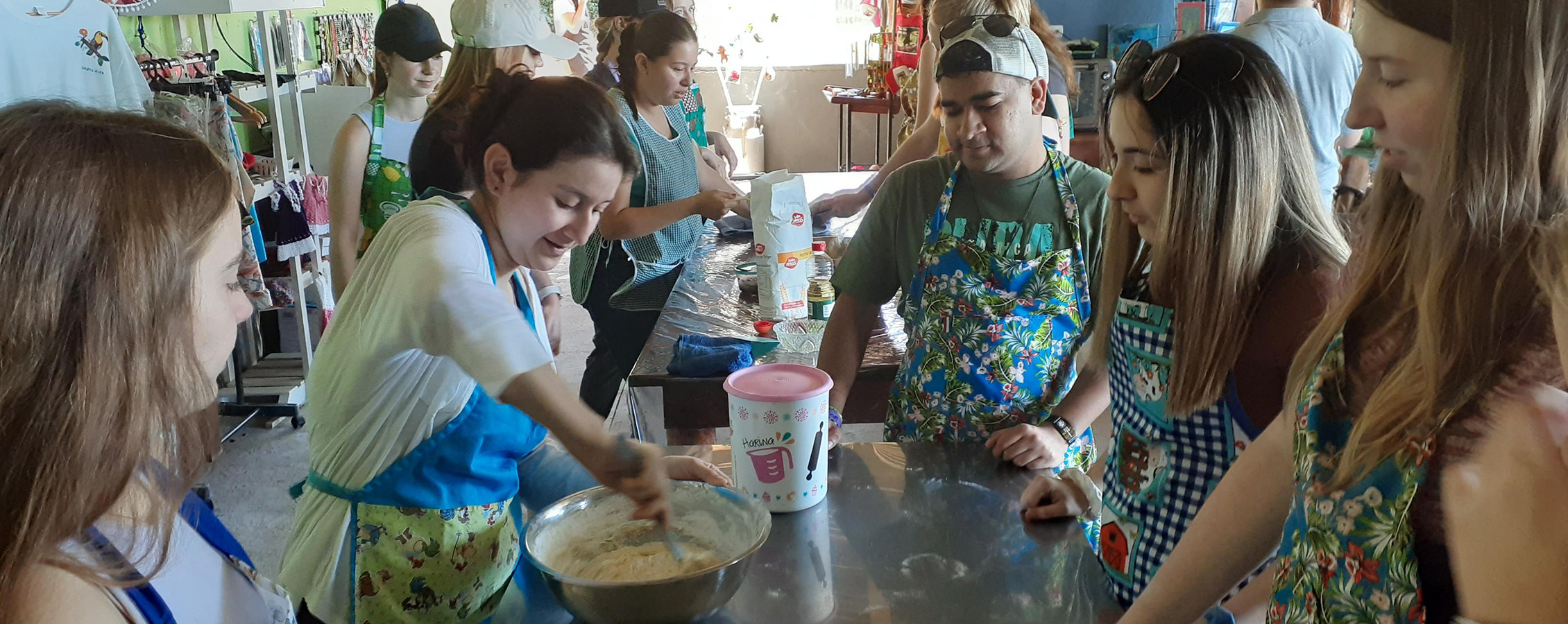 UW-Whitewater students learning to bake a traditional food in Costa Rica