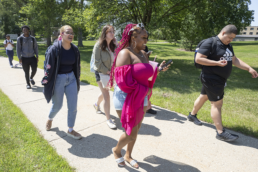 Students walk through campus.