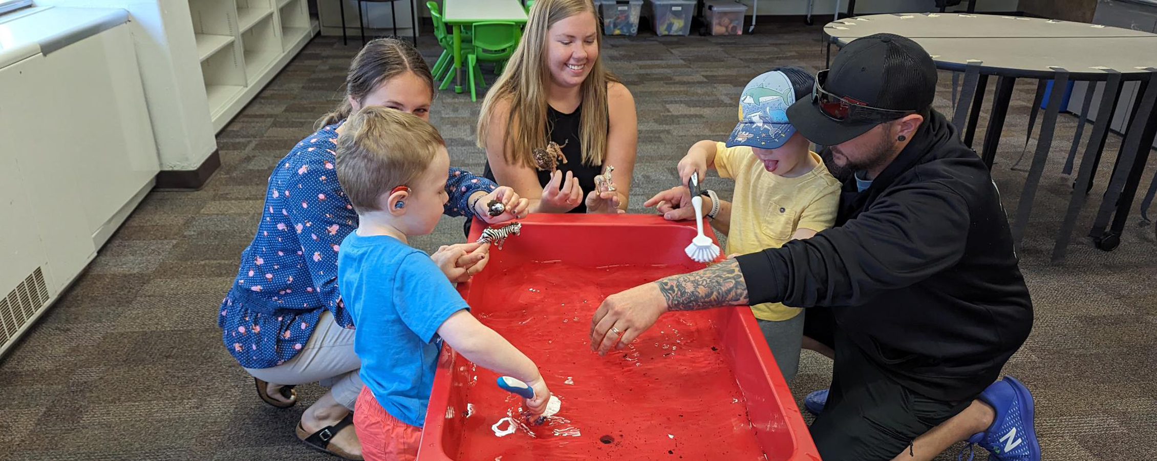 SES and Language development instructor works with student