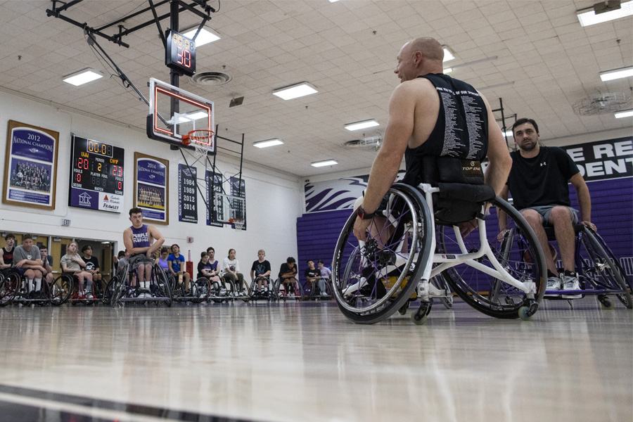 Opie Lade coaches wheelchair basketball.
