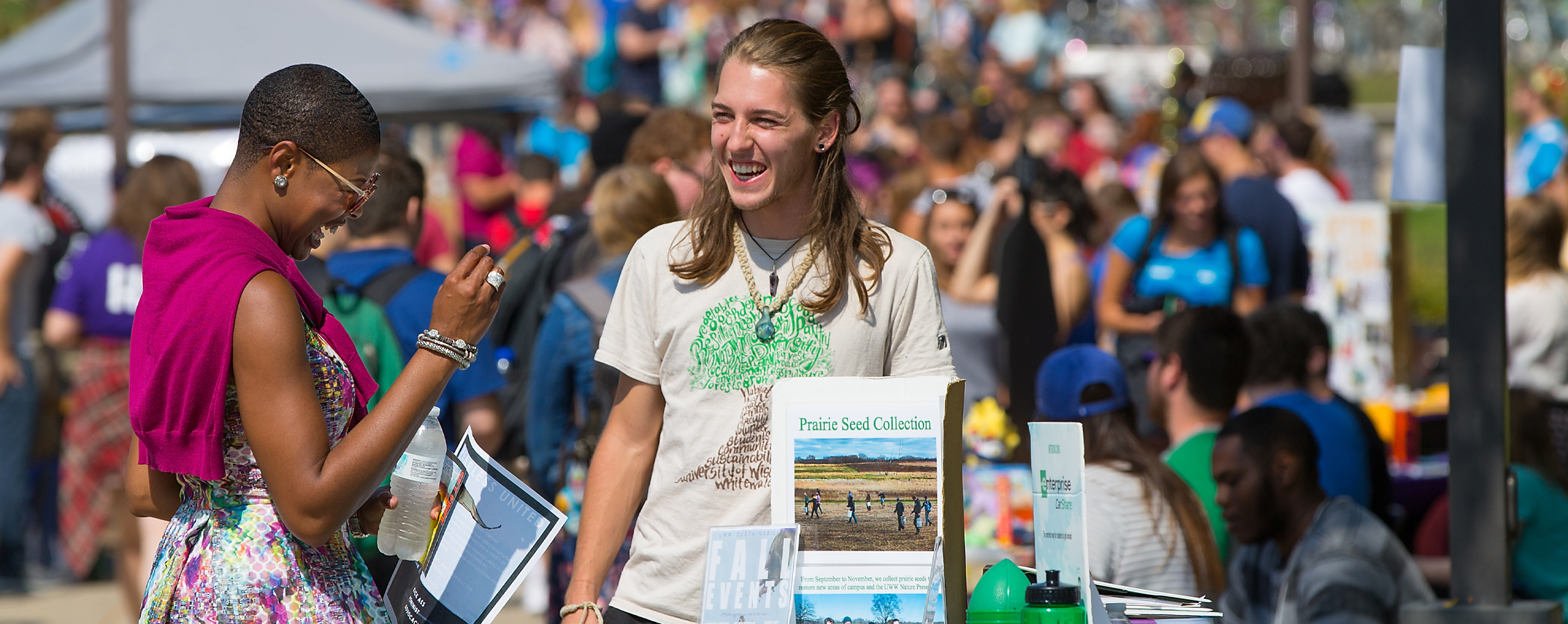 Artanya Wesley laughs with a student.