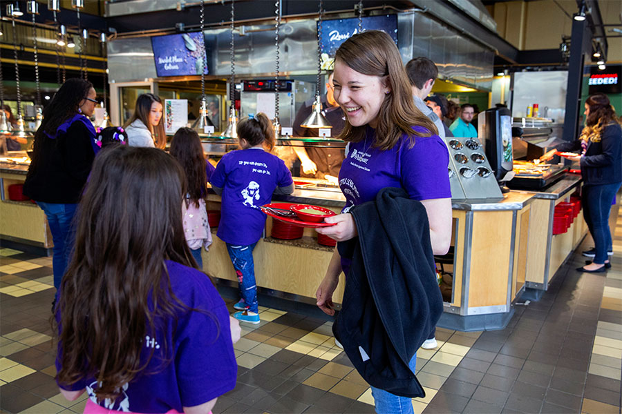 Special Education major student eats lunch at University Center