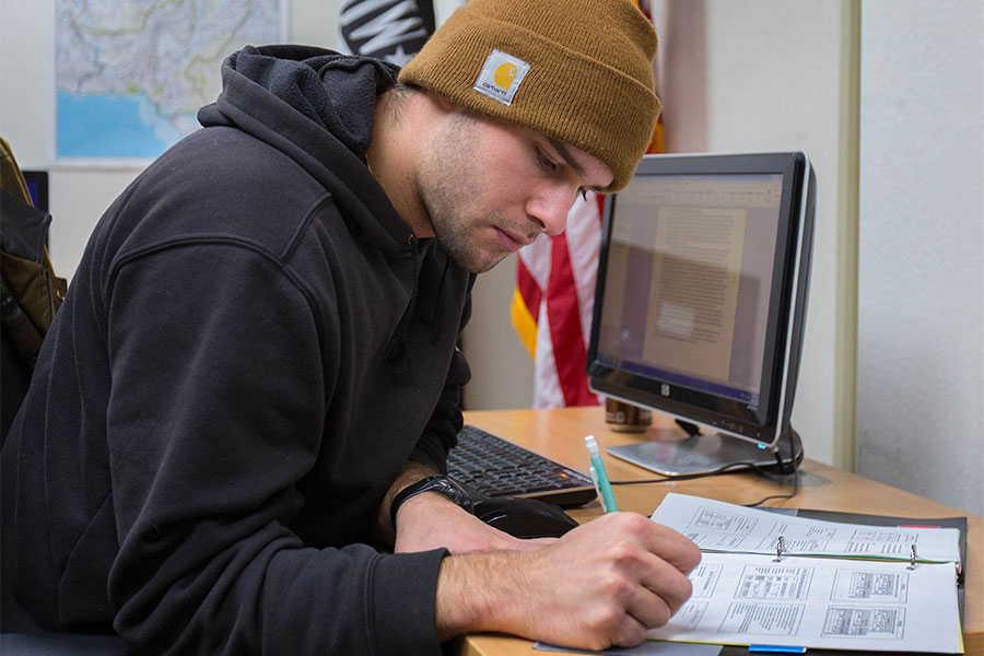  John Wiederholt works in the Veterans and Service Members Lounge in Andersen Library on the UW-Whitewater campus.