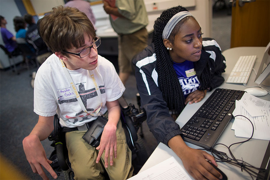  Students working on a computer.