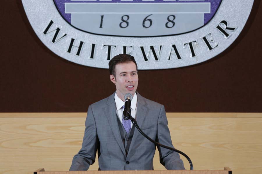 Jeff Angileri speaks at a podium.