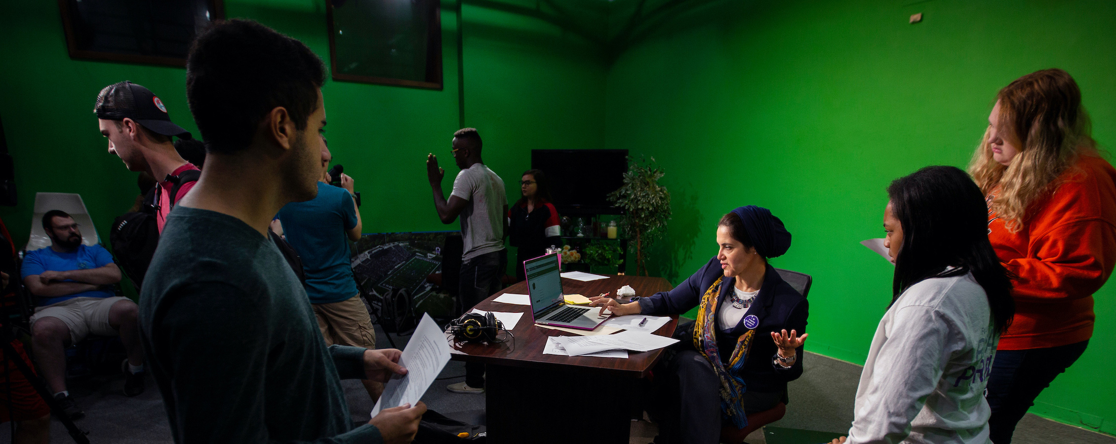 Theatre students rehearse with a professor for the next performance