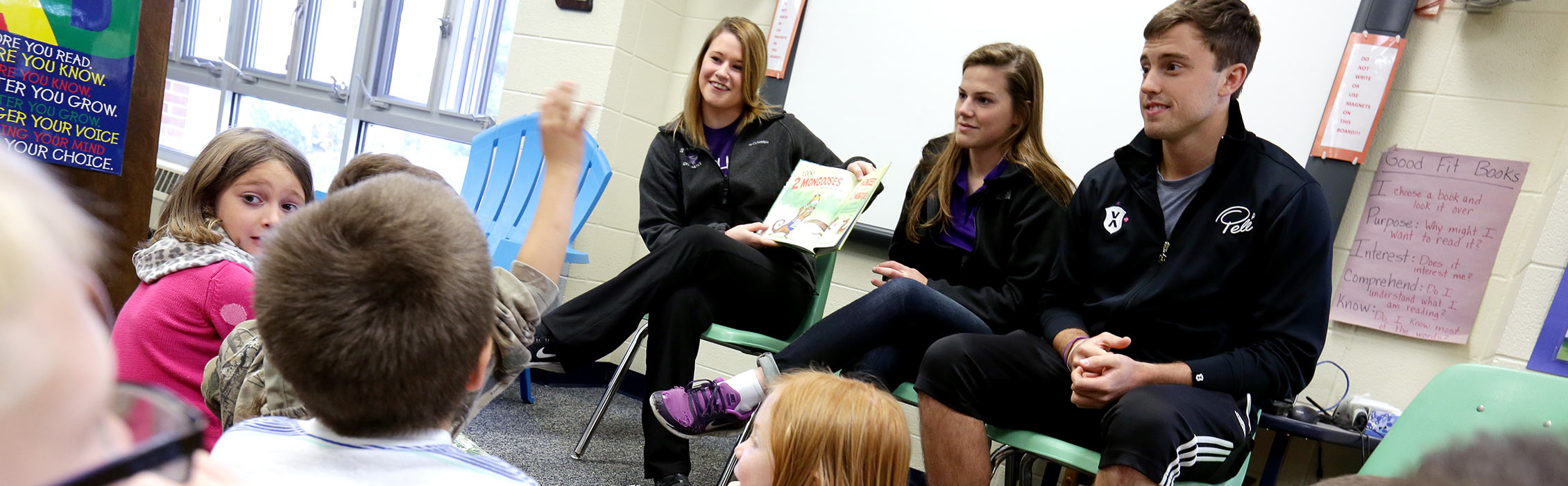 UW-Whitewater College of Education students reading to children
