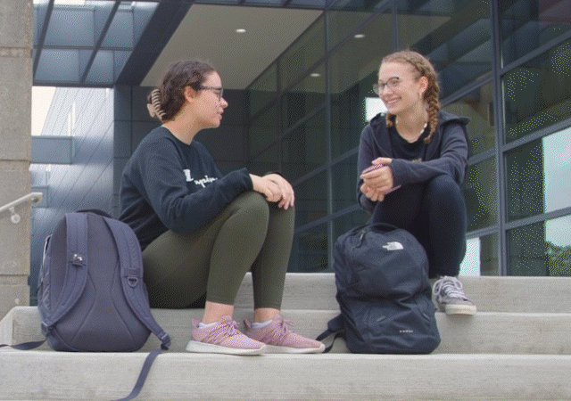 Rotating images of students on campus.