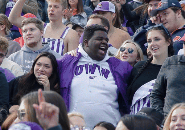 Rotating images of students on campus.