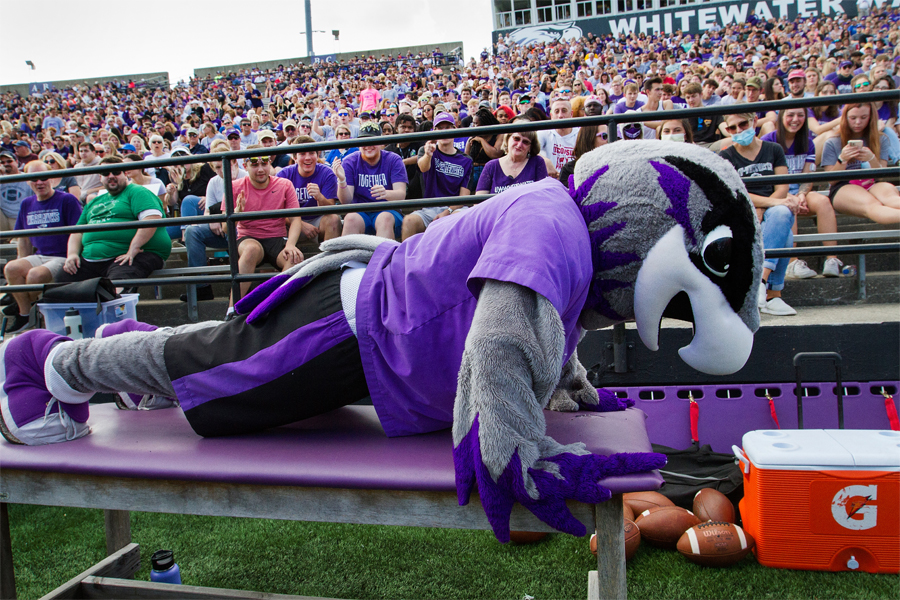 Willie Warhawk in a Warhawks jersey spreads his wings.