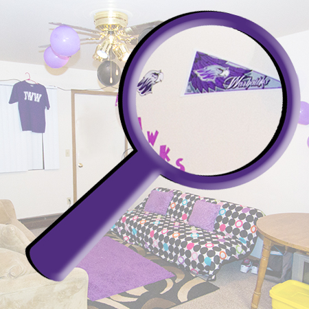 Dorm room with a large magnifying glass over the photo enlarging part of the room