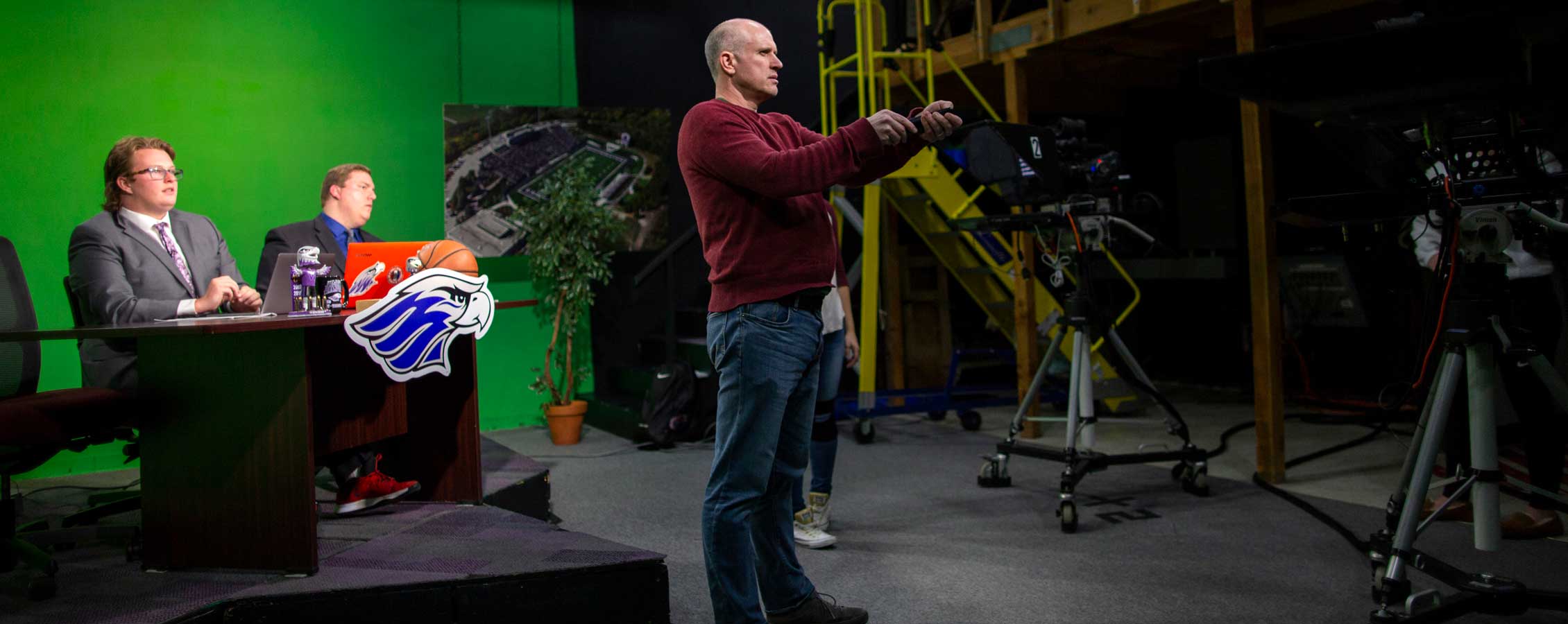 Jim Mead stands in the television studio.