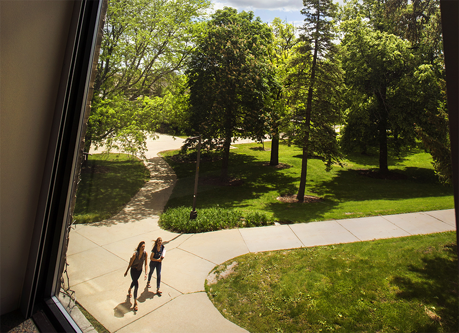 A window from a classroom at Hyer Hall looks out on Chopp Arboretum on campus.