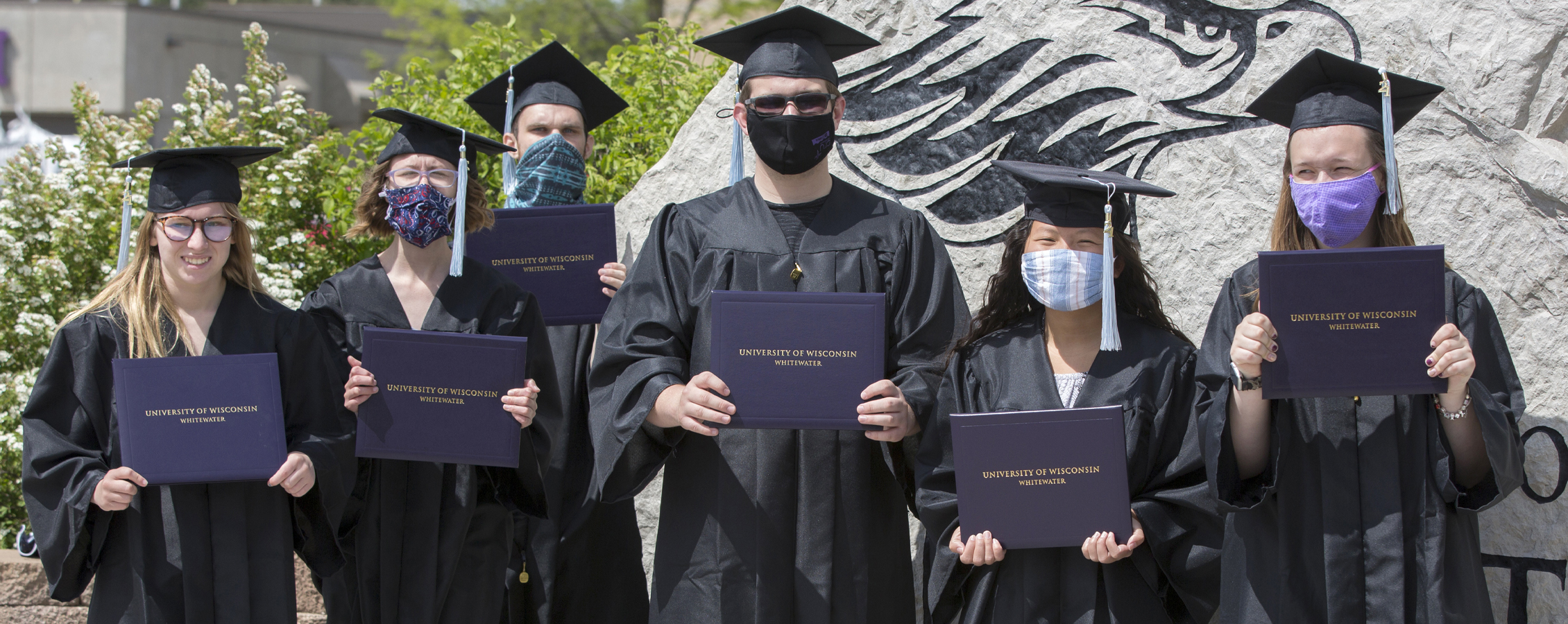 Six LIFE program graduates in cap and gown.