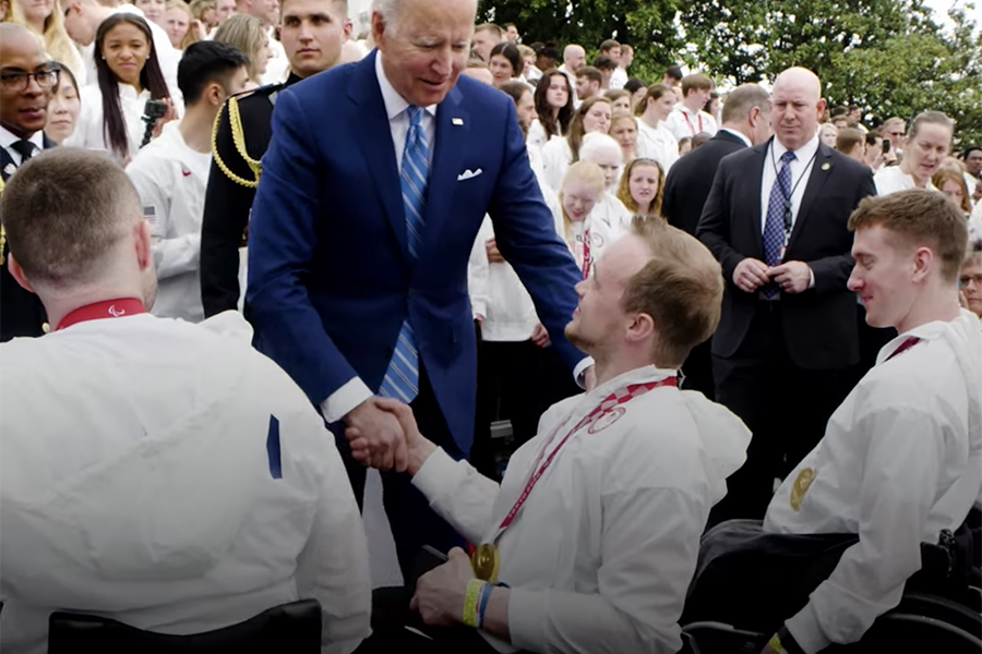 John Boie shakes President Biden's hand in front of the White House.