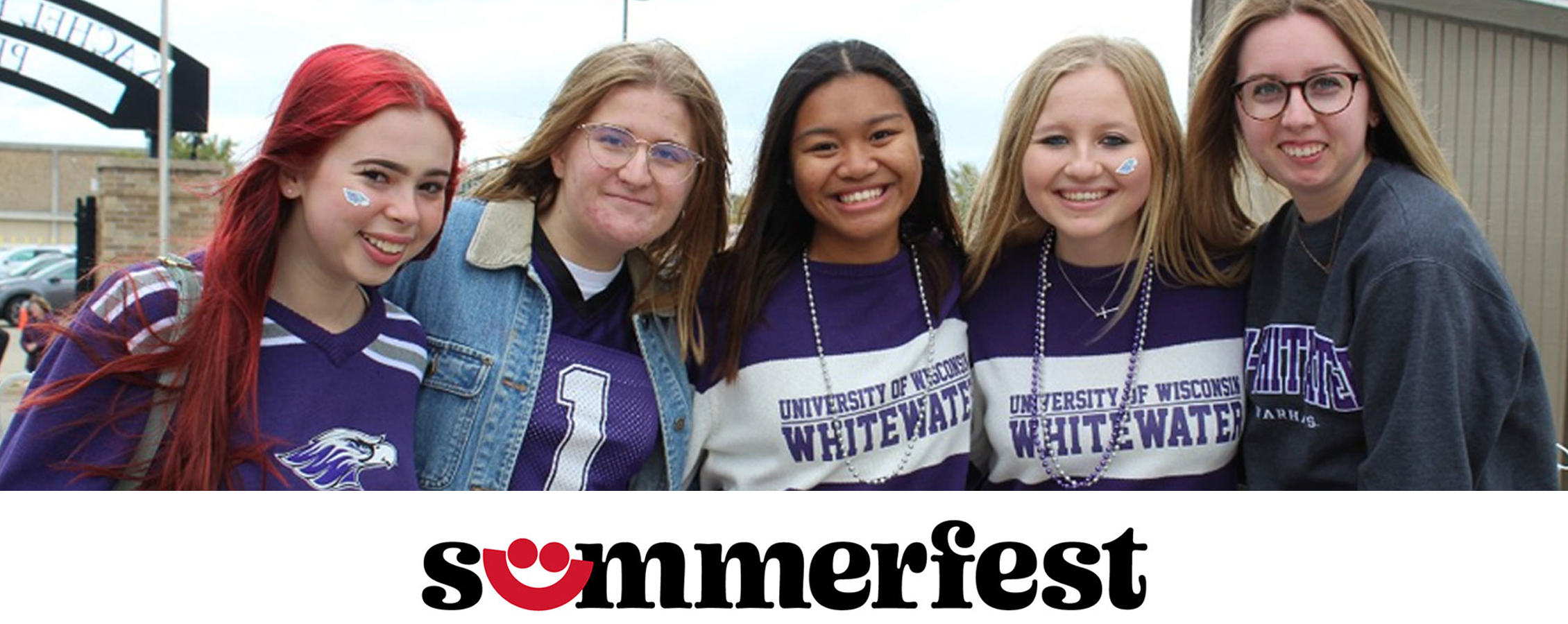 Five young people wearing UW-Whitewater shirts.