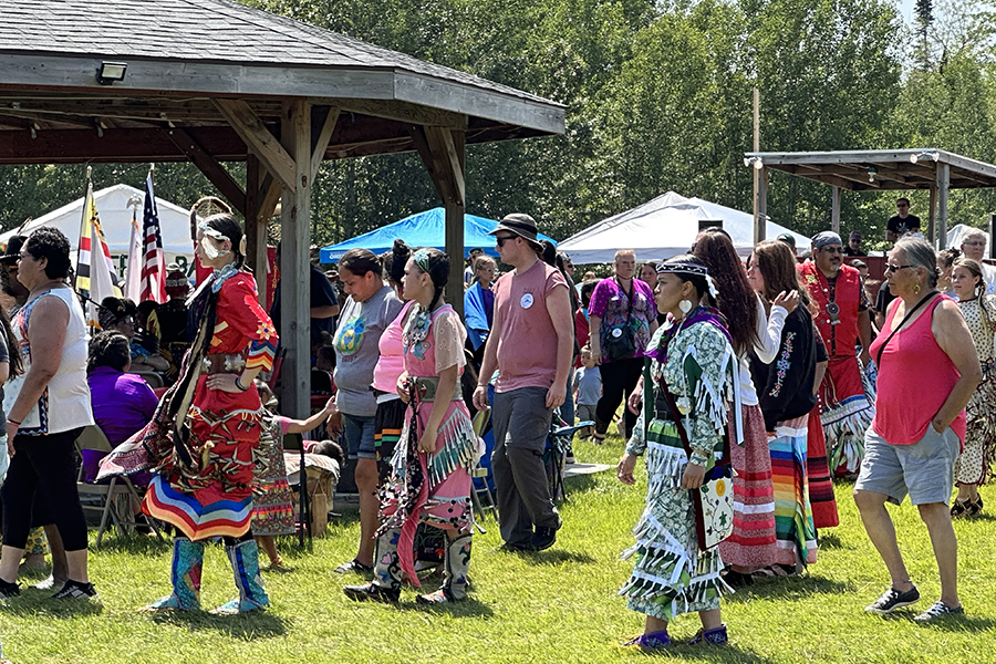 People gather for a pow wow.