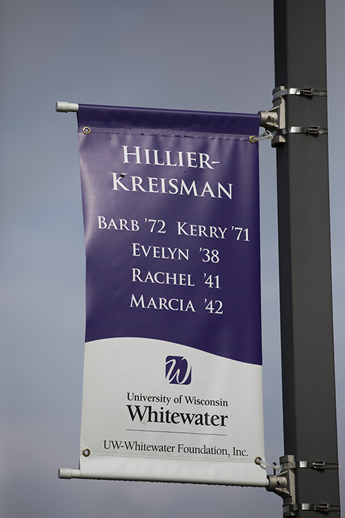 Purple banner on the Whitewater campus honoring her mother, two aunts and sister.