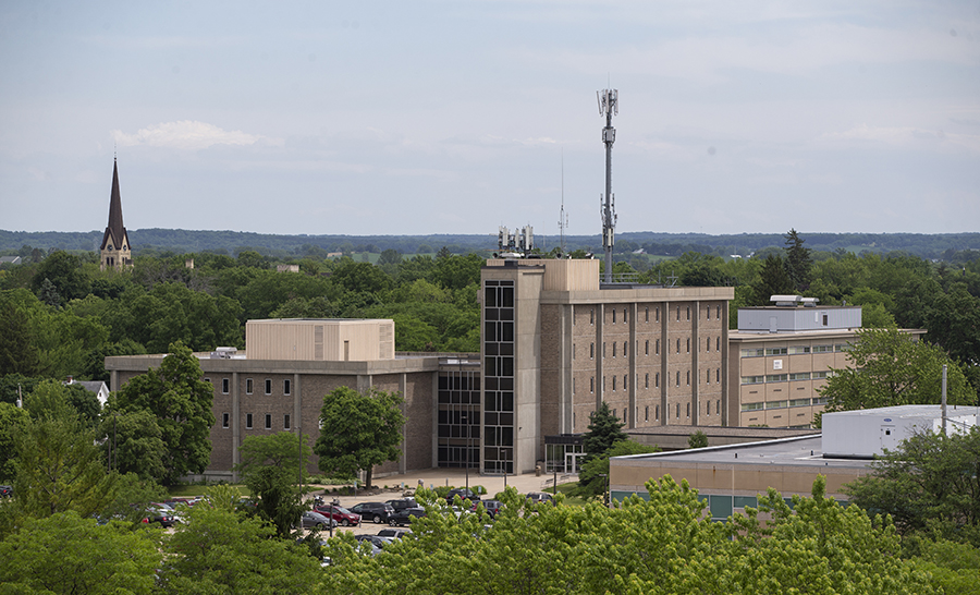 A view of Winther Hall surrounded by trees on the UW-Whitewater campus.