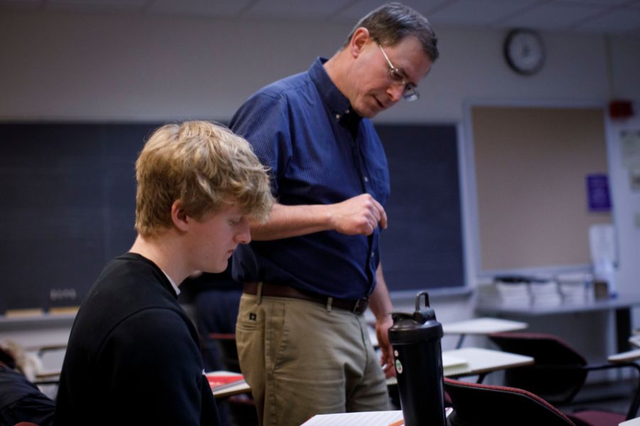 Professor is in class with student.