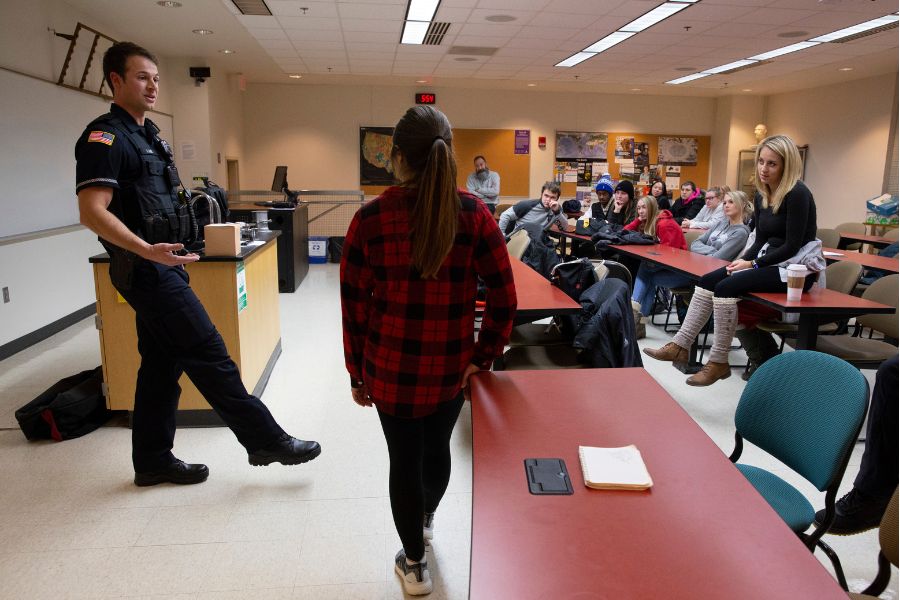 UW-Whitewater Police Officer Dan Kuehl, left, demonstrates roadside testing of drivers who are suspected of operating while intoxicated.