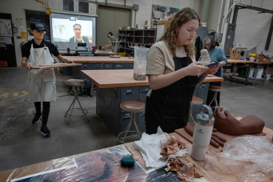 Students are working on clay projects at the Art center.