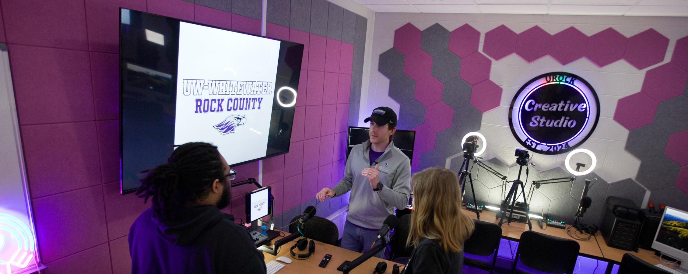 Students are in a creative studio.
