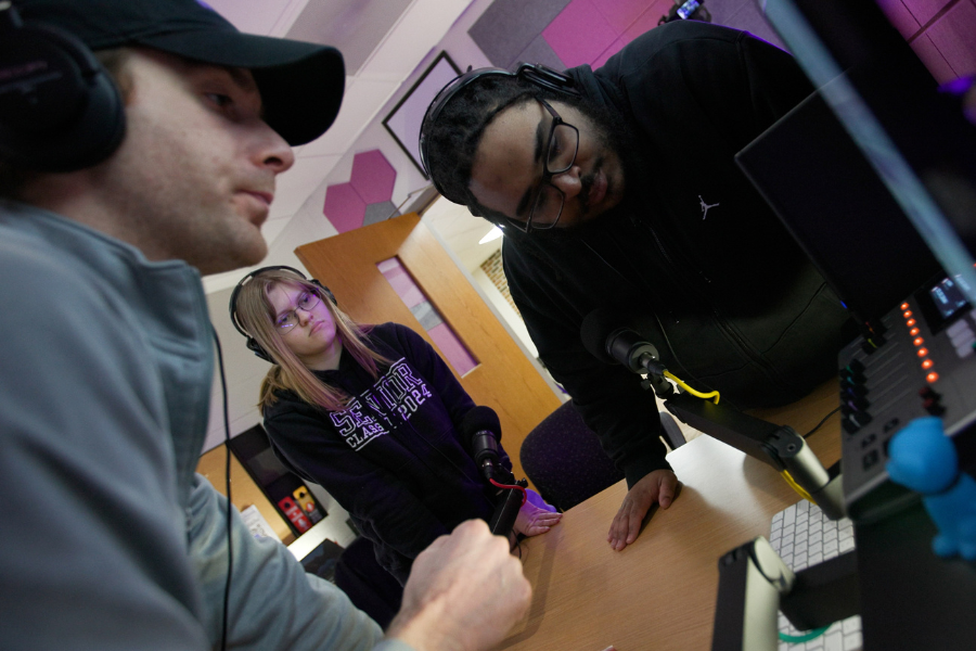 Trevor Rees gives a tour of the Creative Studio to students Peyton Bishop of Fort Atkinson and John Venable of Milwaukee at the UW-Whitewater at Rock County campus on March 5, 2025.