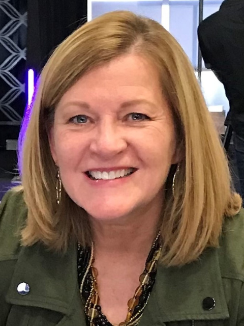 Portrait photo of Sandy Dust.