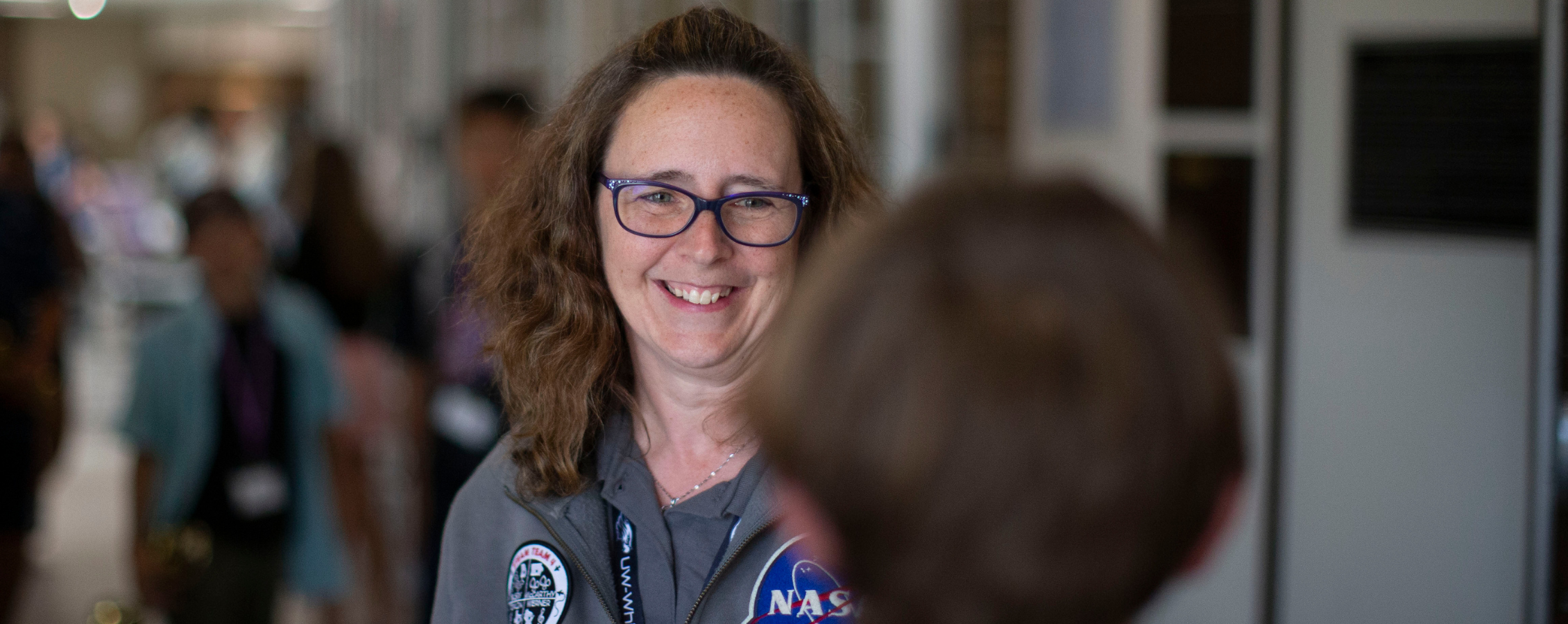 Warhawk alumna Lisa Werner is not only a music educator and band director smile.