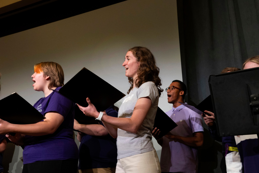 Students sing with Emma.