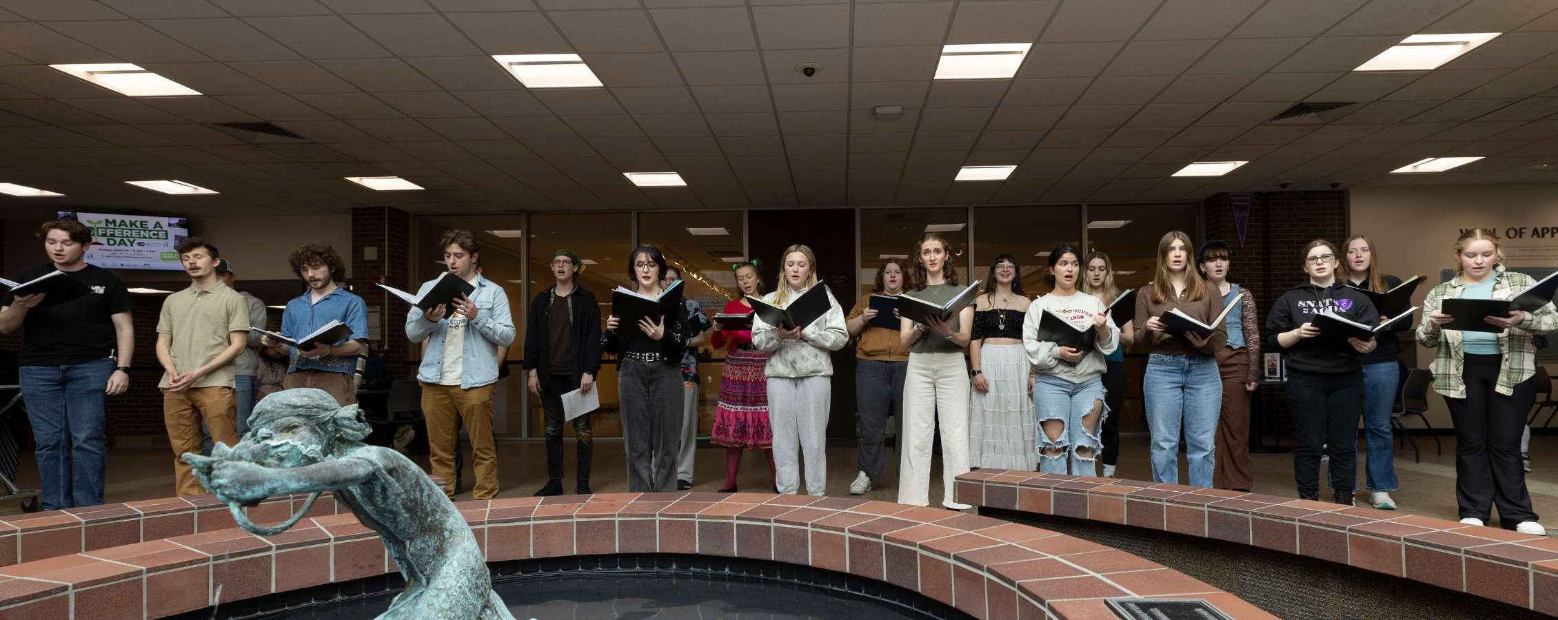 Students sing together.