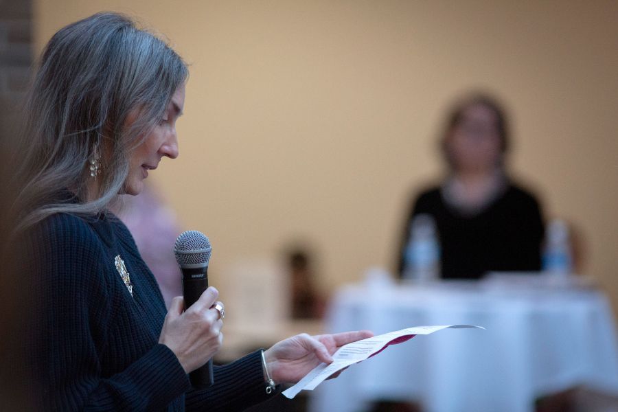 Teresa Faris, professor of art and design, reads a tribute to artist Melanie Sainz, an artist from the Ho-Chunk Nation, in Crossman Gallery in the Greenhill Center of the Arts in March 2024. Sainz, the 2024 Schuh Visiting Artist, worked with UW-Whitewater students to create 