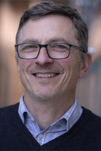 Headshot of John McGuigan.