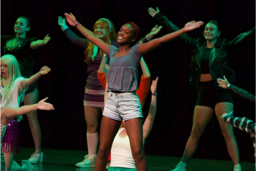 Students perform at the Homecoming talent show. 
